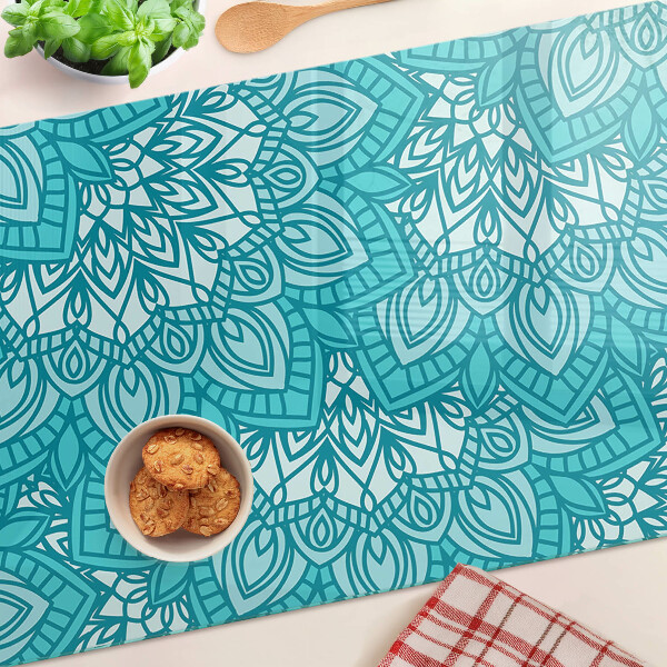 Glas-Schneidebrett mit Mandala-Muster in Blautönen