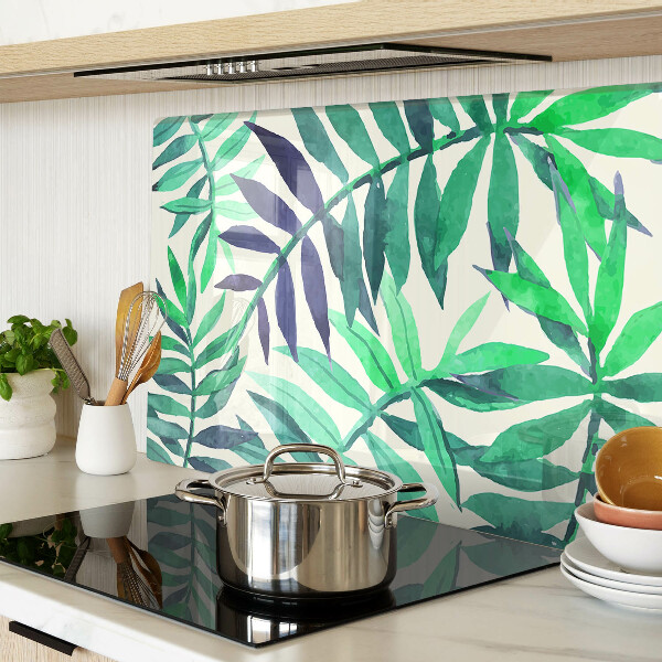 Glas-Schneidebrett mit Palmenblättern im Aquarellstil