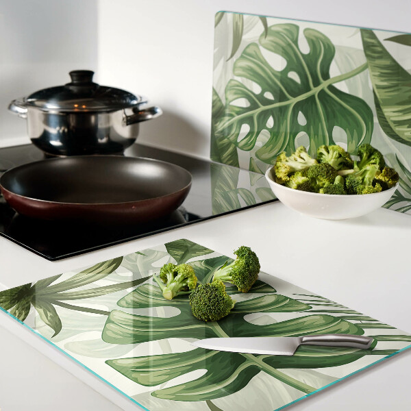 Schneidebrett mit Motiv tropischer Blätter