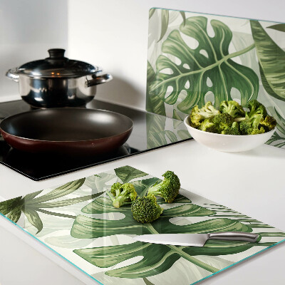 Schneidebrett mit Motiv tropischer Blätter
