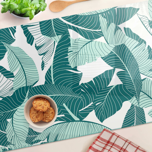 Schneidebrett Glas mit Motiv tropischer Blätter in Grüntönen
