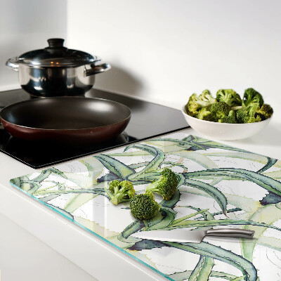 Schneidebrett Glas mit Pflanzenblättern im Aquarellstil