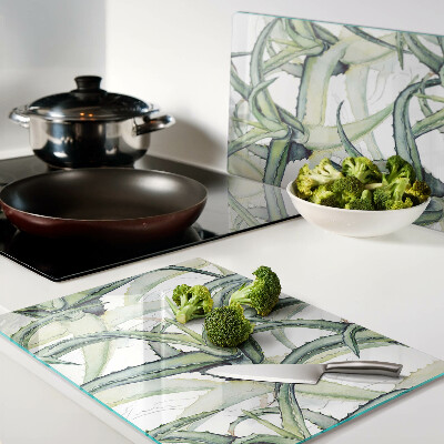 Schneidebrett Glas mit Pflanzenblättern im Aquarellstil