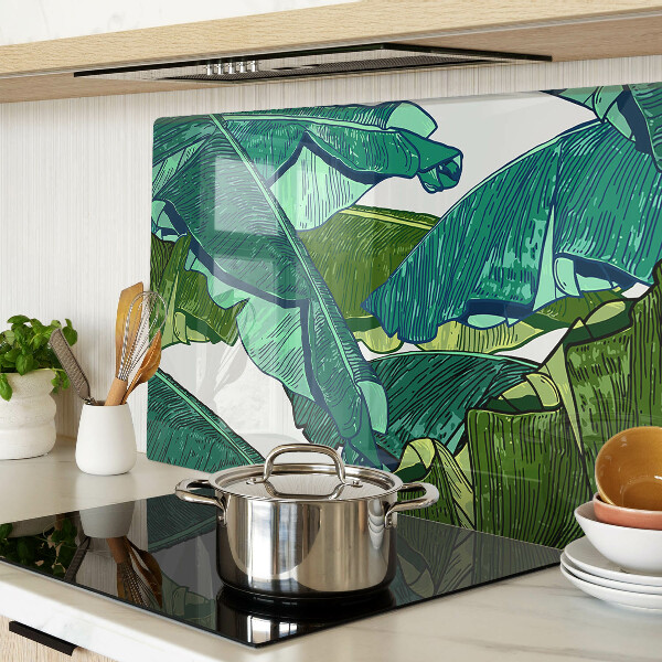 Glas-Schneidebrett mit Motiv aus Palmenblättern in Grüntönen