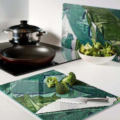 Glas-Schneidebrett mit Motiv aus Palmenblättern in Grüntönen