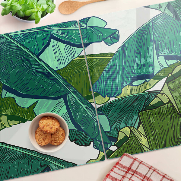 Glas-Schneidebrett mit Motiv aus Palmenblättern in Grüntönen