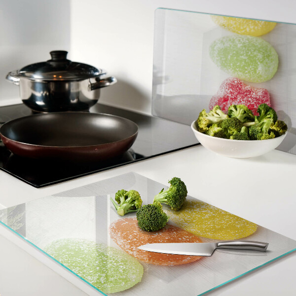 Schneidebrett Glas mit süßigkeitenmotiv in Regenbogenfarben