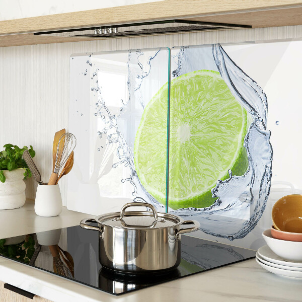 Glas-Schneidebrett mit Motiv einer Zitrone im Wasser