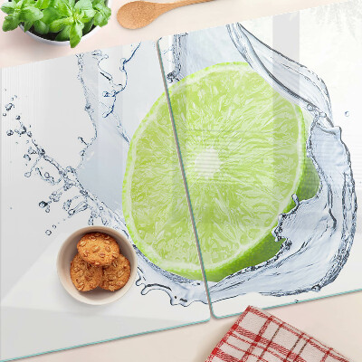 Glas-Schneidebrett mit Motiv einer Zitrone im Wasser