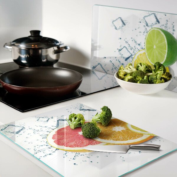 Schneidebrett glas Zitrusfrüchte in bunten Scheiben