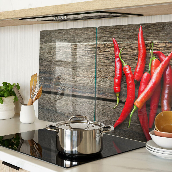 Schneidebrett glas Chilischoten auf Holzgrund