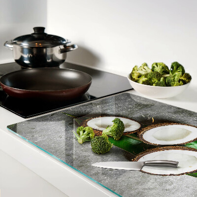 Schneidebrett glas Kokosnuss auf Betongrund