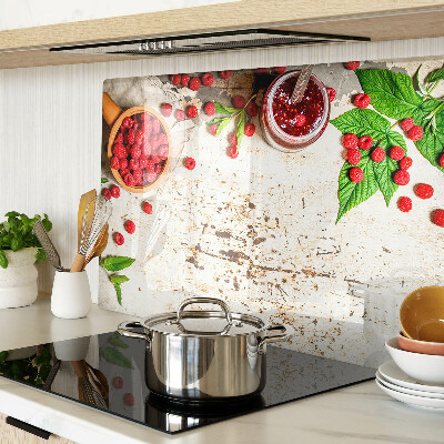 Glas-Schneidebrett mit Motiv aus Himbeeren und Blättern