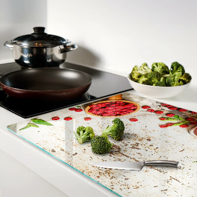 Glas-Schneidebrett mit Motiv aus Himbeeren und Blättern