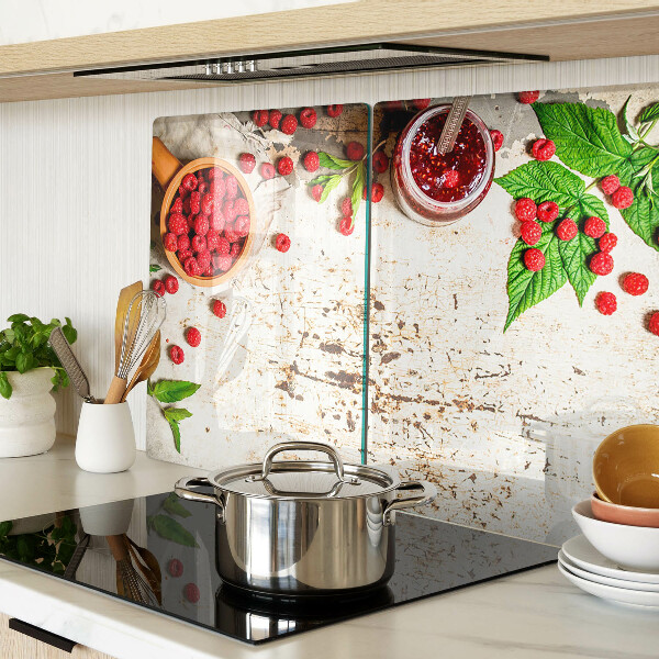 Glas-Schneidebrett mit Motiv aus Himbeeren und Blättern