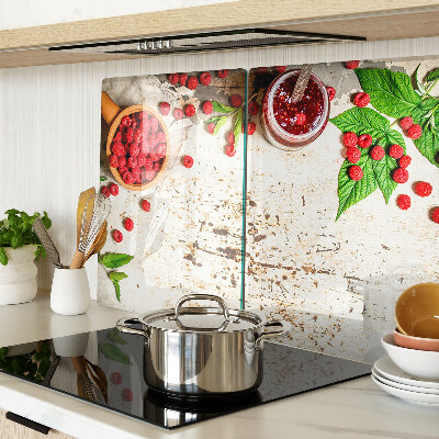 Glas-Schneidebrett mit Motiv aus Himbeeren und Blättern