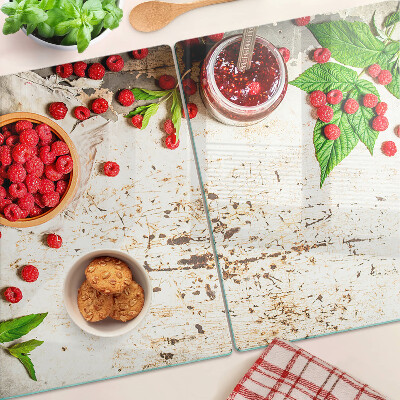 Glas schneidebrett Himbeeren und Blätter