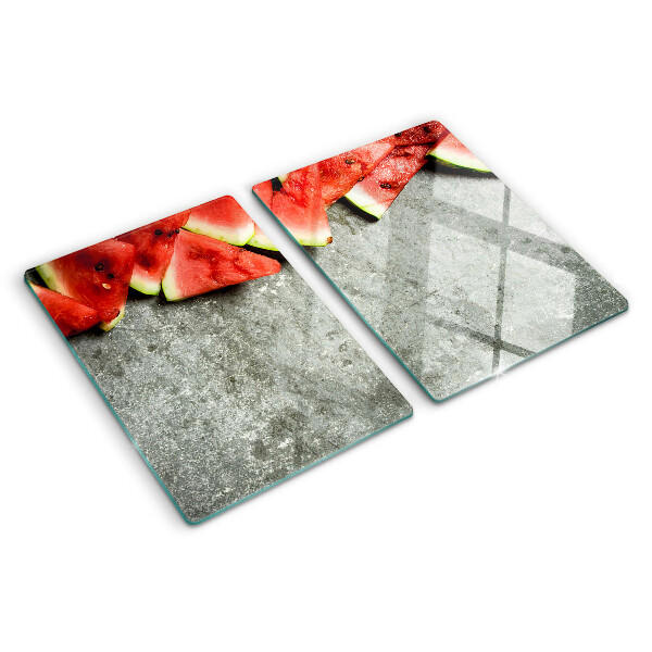 Schneidebrett Wassermelonenscheiben auf grauem Hintergrund