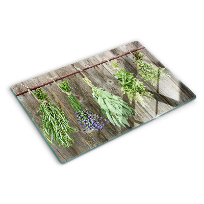 Glas schneidebrett Kräuter auf Holzgrund