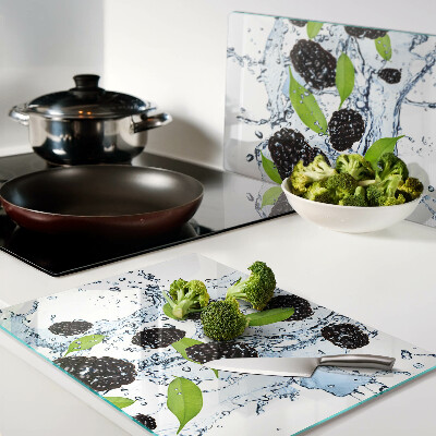 Glas schneidebrett Früchte im Wasser