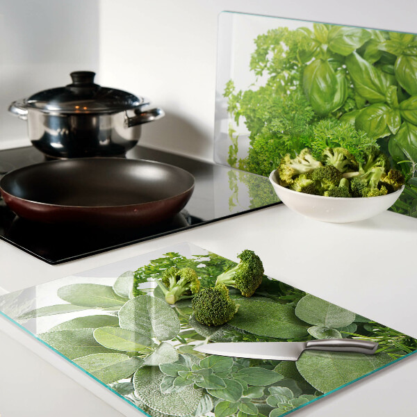 Glas-Schneidebrett mit grünem Kräuter- und Blättermotiv