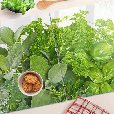 Glas-Schneidebrett mit grünem Kräuter- und Blättermotiv