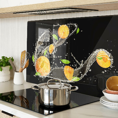 Glas-Schneidebrett mit Motiv aus Zitrusfrüchten im Wasser