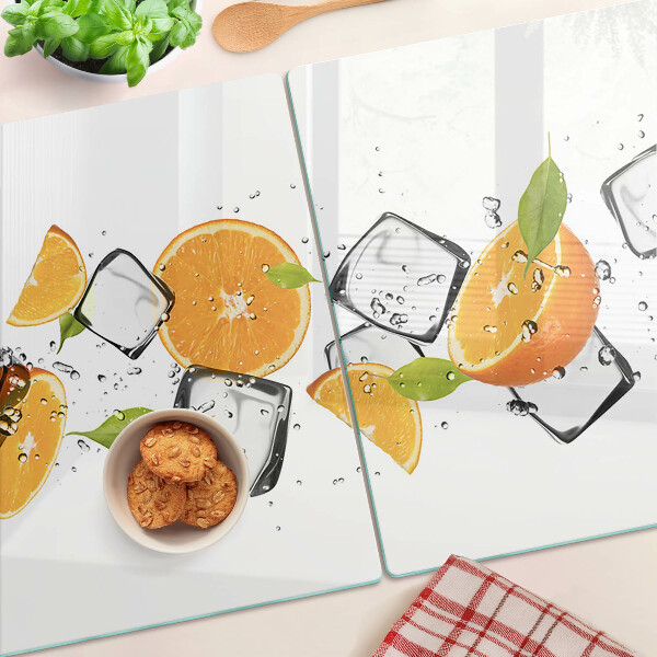 Schneidebrett mit Motiv aus Zitrusfrüchten und Eis
