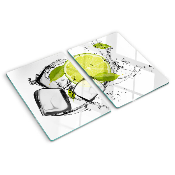Glas schneidebrett Zitrone mit Eis und Blättern
