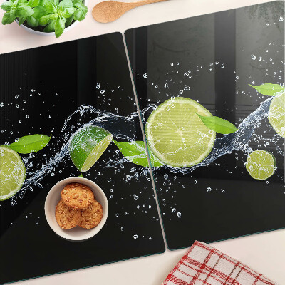 Glas Schneidebrett mit Motiv von Zitronen in Wasser und Minzblättern