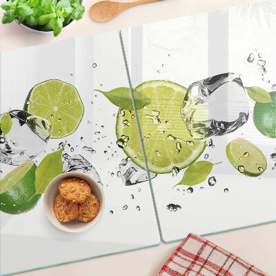 Schneidebrett Glas mit Motiv aus Zitronen und Eis im Wasser
