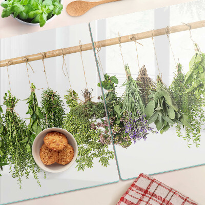 Schneidebrett glas Getrocknete Kräuter an einer Schnur