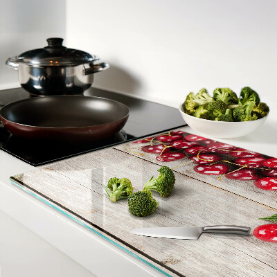 Glas schneidebrett Kirschen auf Holzgrund