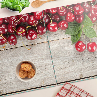 Glas schneidebrett Kirschen auf Holzgrund