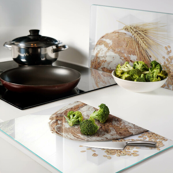 Schneidebrett mit Motiv aus Brot und Getreide