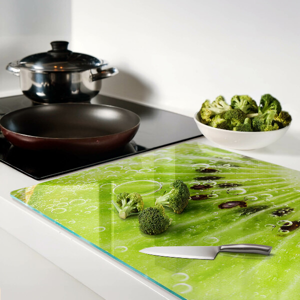 Glas schneidebrett Kiwi mit Wassertropfen