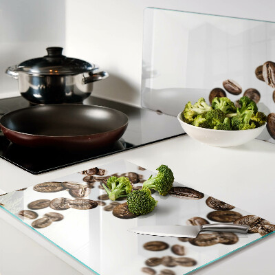 Schneidebrett Glas mit Motiv Kaffeebohnen in Bewegung