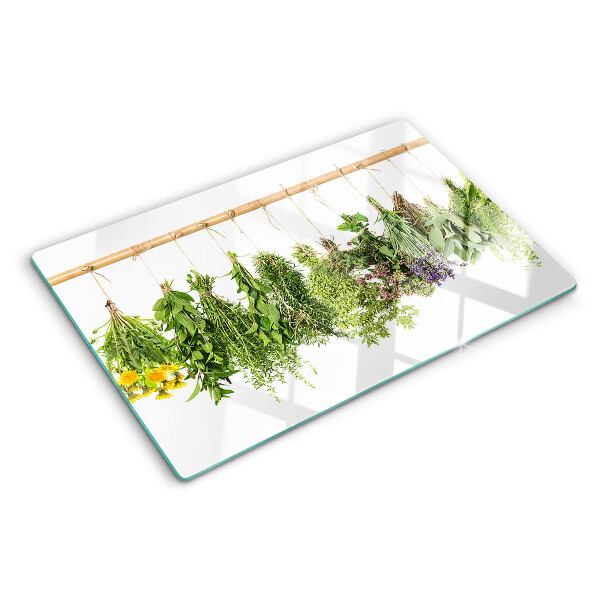 Schneidebrett Getrocknete Kräuter an einer Schnur