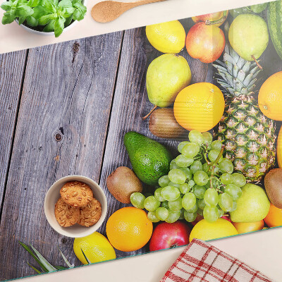 Schneidebrett Früchte auf Holzgrund