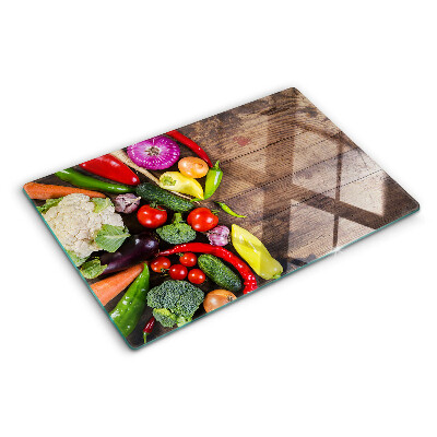 Glas schneidebrett Gemüse auf Holzgrund