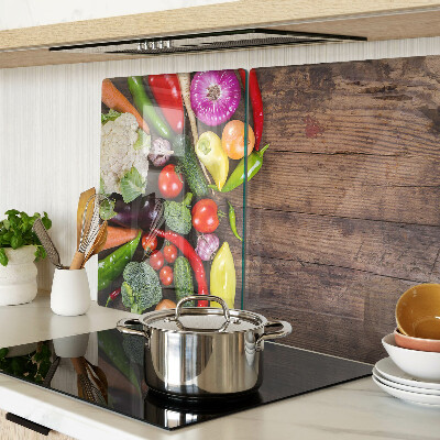 Glas schneidebrett Gemüse auf Holzgrund