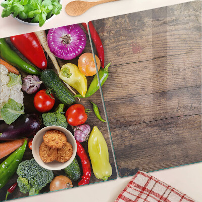 Glas schneidebrett Gemüse auf Holzgrund