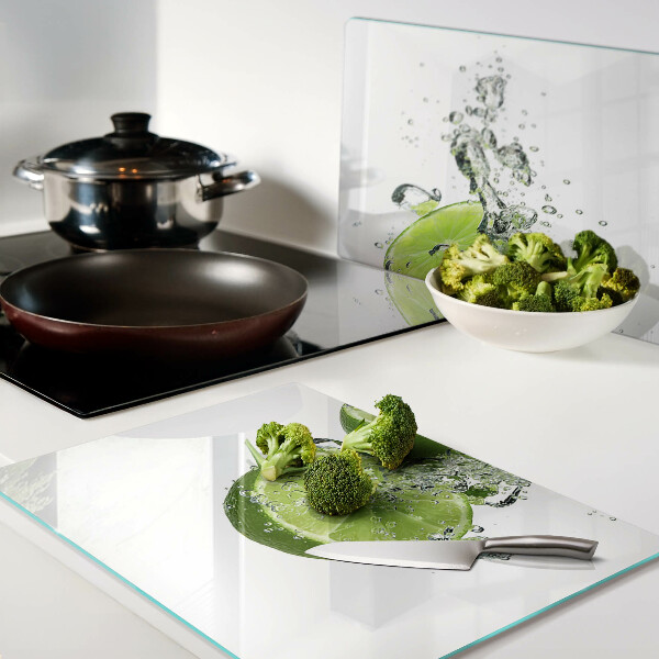 Glas-Schneidebrett mit Motiv von Zitronen in Sprudelwasser