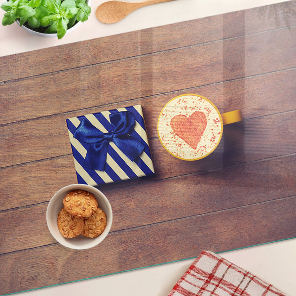 Schneidebrett glas Ein Geschenk mit einem Herz auf einer Tasse