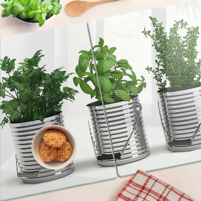 Schneidebrett mit Motiv von Pflanzen in Metalltöpfen