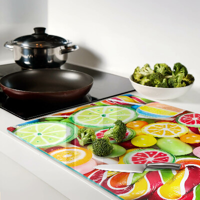 Glas-Schneidebrett mit Motiv aus Süßigkeiten und Früchten