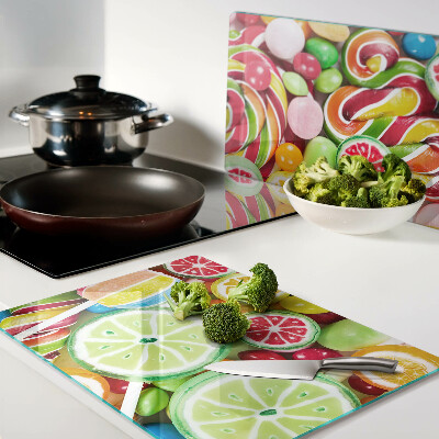 Glas-Schneidebrett mit Motiv aus Süßigkeiten und Früchten