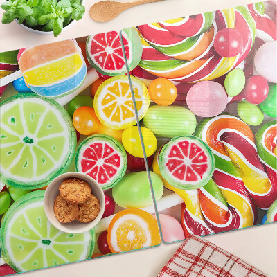 Glas-Schneidebrett mit Motiv aus Süßigkeiten und Früchten