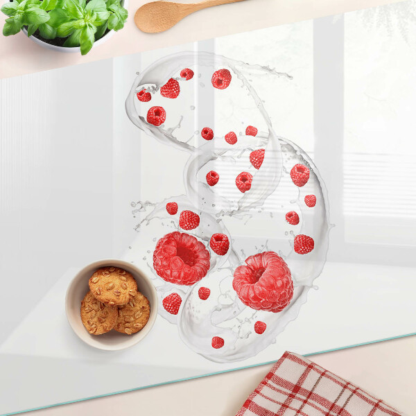 Schneidebrett mit Motiv aus Himbeerblasen in Wasser