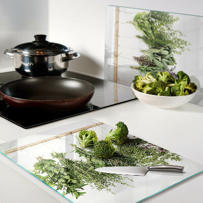 Schneidebrett Glas mit getrockneten Kräutern an einer Schnur